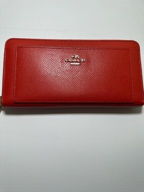 COACH Orange Leather Zip-Around Wallet in excellent condition